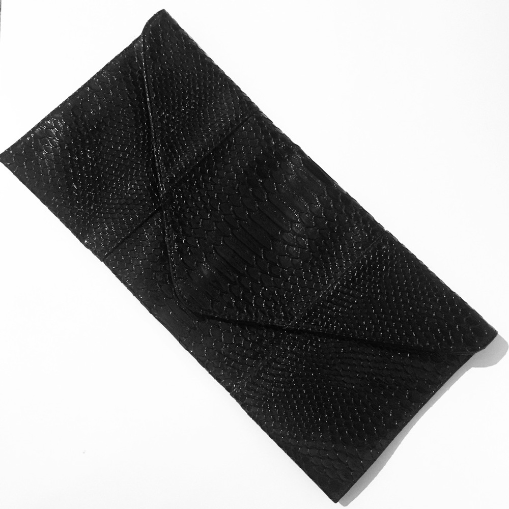 Patent leather alligator print clutch
